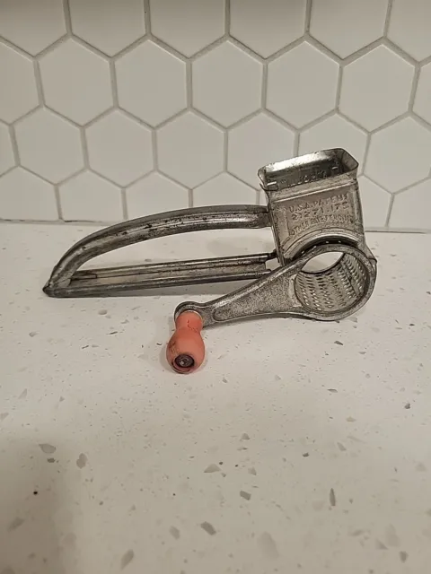 https://www.picclickimg.com/7o4AAOSwTnplZT3b/Vintage-MOULI-Cheese-Grater-Made-In-France-W.webp