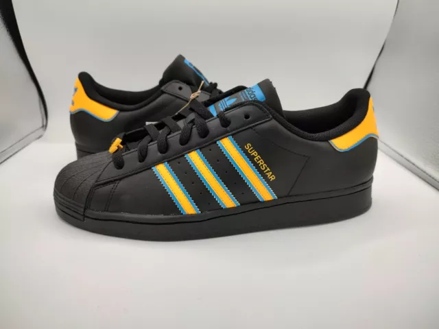Adidas Superstar Shell Toe Sneaker Black/Yellow/Blue FZ5892 NWOB Men’s Size  10.5