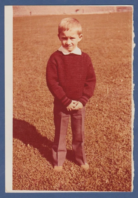 Beautiful boy on the ground. Soviet Vintage Photo USSR