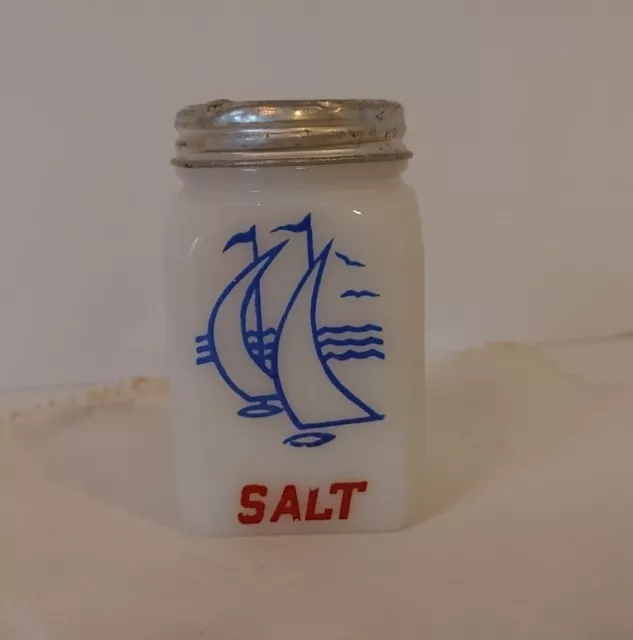 Vintage Salt shaker lid style milk glass jar, Metal lid, sailboat artwork, nice