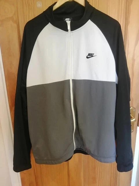 Nike griffin track sale top