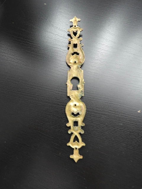 Top boutonné sans manches avec pinces