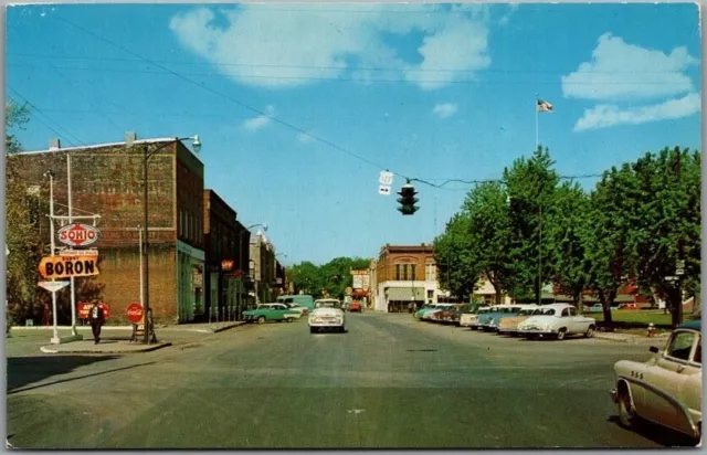 PAULDING, Ohio Postcard "Perry Street, Looking West" Downtown Scene / 1950s Cars