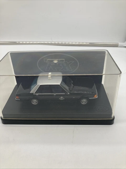 Miniature Trax Ford Falcon GL Taxi 1979 – Échelle 1/43, Blanche, état Correct