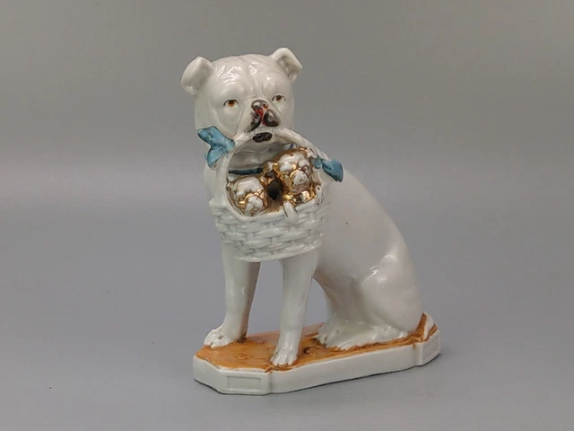 Vintage Pug Dog with puppies in basket Figurine
