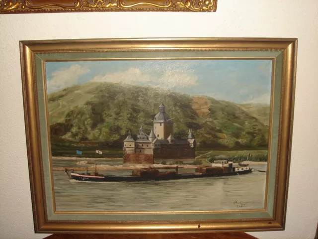 Large old oil painting,{ River view with a boat and castle, is signed & dated }.