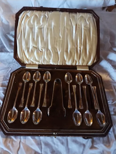 Set Of 12 Spoons With Tongs