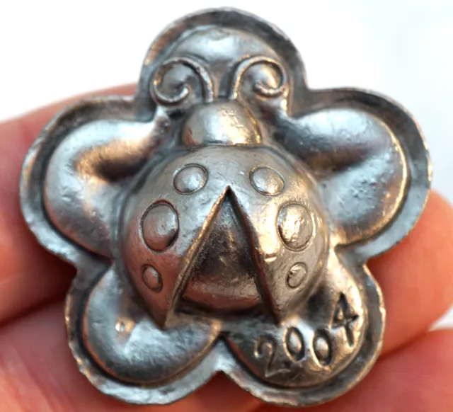 Solid Pewter Figurine Lady Bug on 5 Sided Star or pad Dated 2004