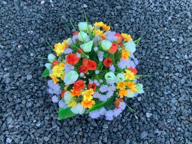 artificial orange  mini tulip flower  arrangement in grave/memorial/crem pot