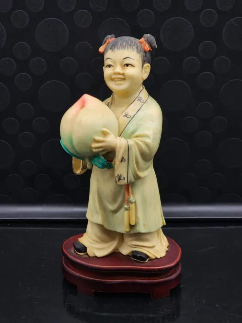 Antique Chinese DETAILED figurine of girl holding giant lucky peach 8.50"