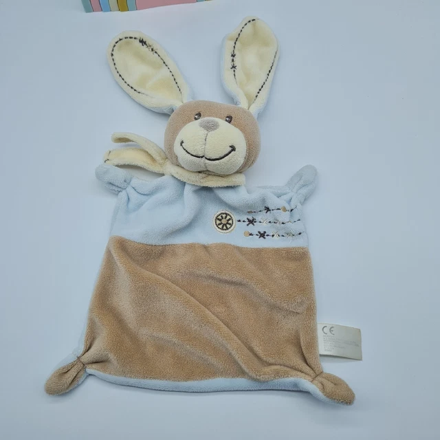 26 - Doudou Nicotoy Simba Lapin Plat Bleu Croix Beige Kiabi Marron