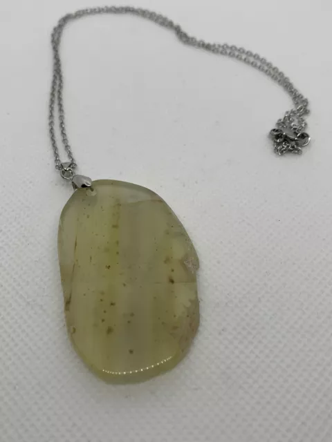 Polished Lt Brown Agate Slice 5.5cms With A 50cm Silver Plated Chain.