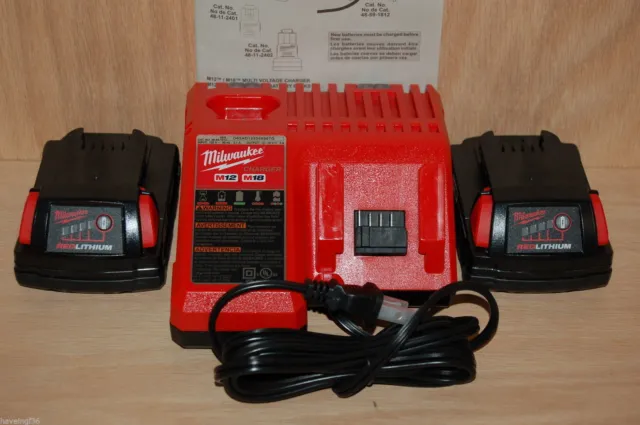 Brand New Milwaukee M12 & M18 Dual Charger plus 2 new M18 Batteries 48-11-1815