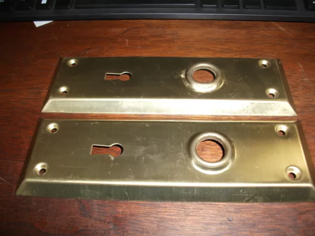 Vintage Brass Plated Steel Doorknob Back Plate  7" x 2 1/4" holes 2 1/4"  5/8" D
