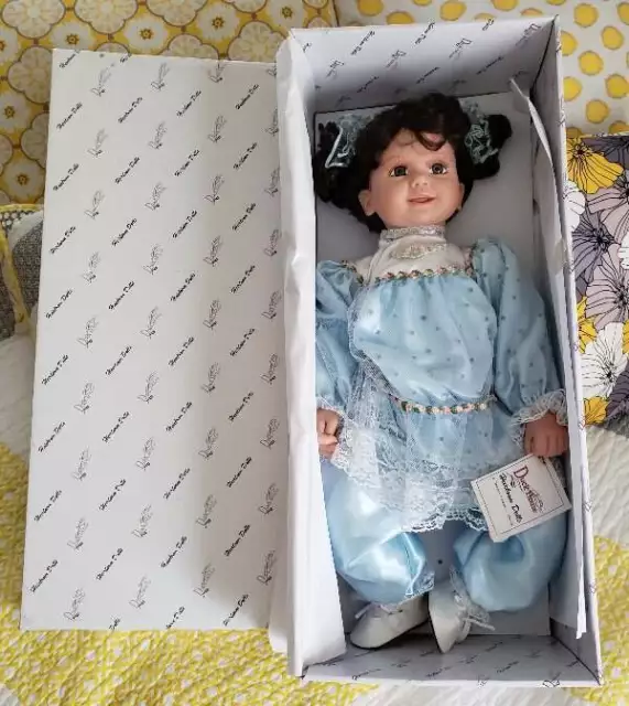 Duck House Heirloom Dolls Tami Baby Doll Dark Brown Hair Blue Outfit Pigtails