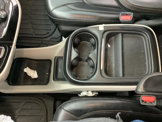 Used Front Lower Center Console fits  2017 Chrysler Pacifica floor w o retractab