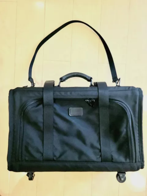 Tumi Black Ballistic Nylon Rolling Suitcase Luggage Travel Bag 4 Wheels 20 x 13"