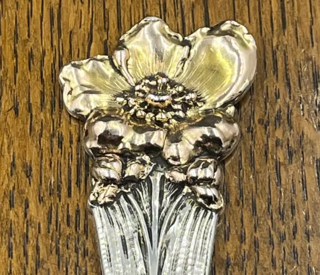 Large American sterling silver & 14K serving spoon with flowers