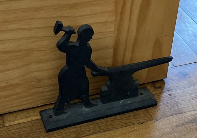 Antique  figure of iron man working with an anvil Heavy hard to find 7" H x 8.5"