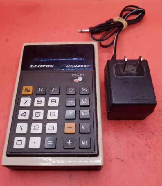 Vintage Lloyd's Accumatic E 311 Calculator with Power Adaptor, Tested Working