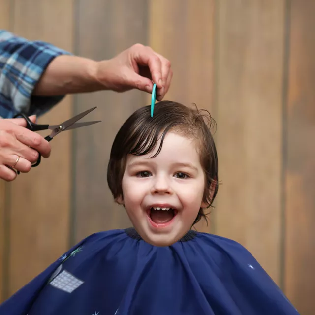 Kinderfriseurtuch Stoff Arbeit Kinder-Overalls Haarschnittumhang Friseurkittel