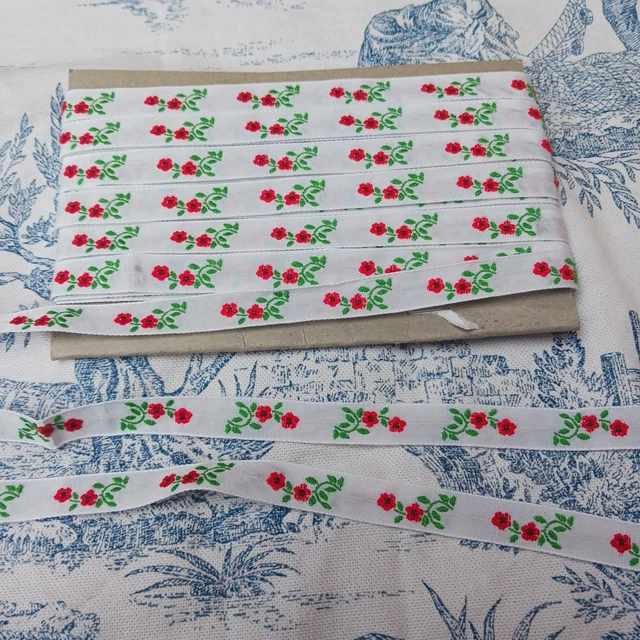 Galon jacquard coeurs et fleurs 25mm bleu turquoise au mètre
