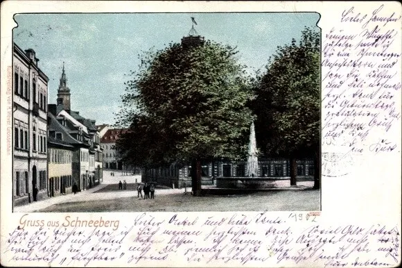 Ak Schneeberg im Erzgebirge, Straßenpartie, Springbrunnen, Wohnhäuser - 10427020