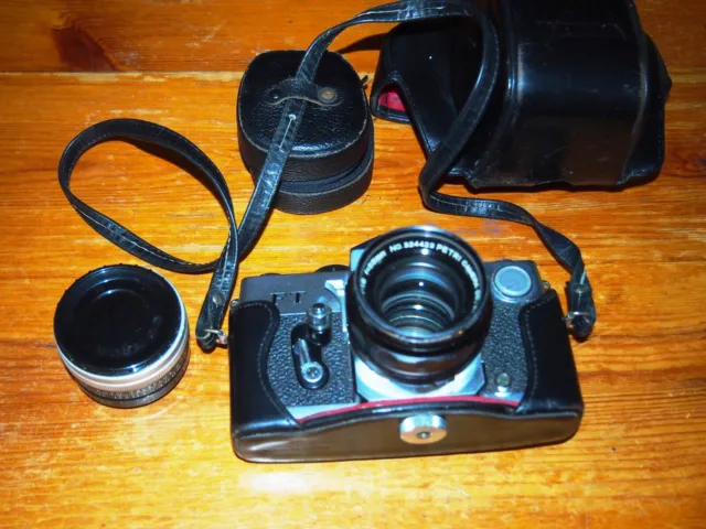 Petri FT SLR camera in very good condition with 55mm lens and 2x lens.
