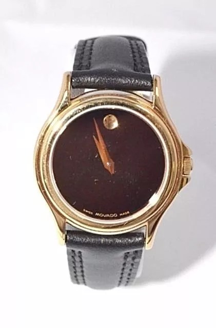 W317- Womens  Swiss Movado Museum Folio Black Museum Dial Leather Gold Watch