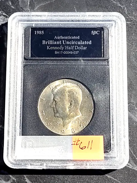1985-P Kennedy half dollar  UNCERCULATED WITH A Golden toning on front and back