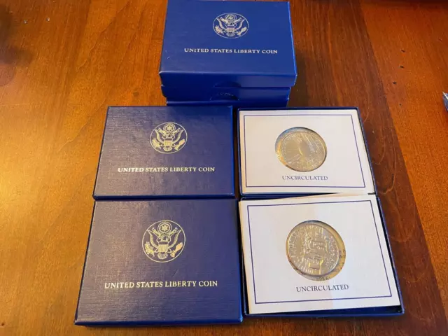 Lot of 5 Statue of Liberty Half Dollar uncirculated Coins in box with COA