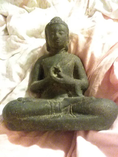 buddha statue Carved From Lava Rock With Hand Gesture  Wheel Of Teaching Old