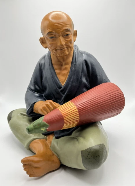 Japanese Hakata Urasaki doll, man with umbrella