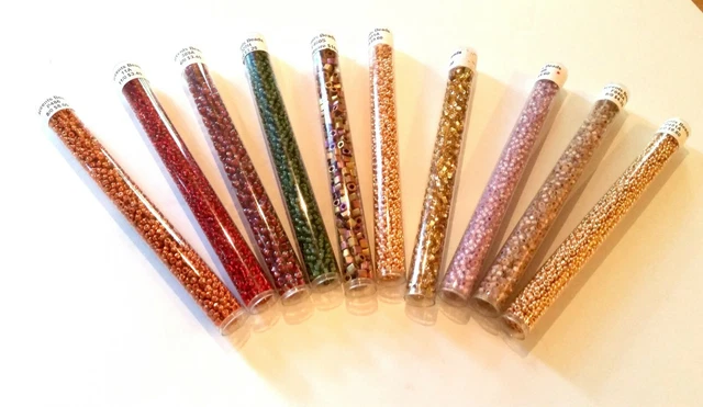 Glass seed beads lot  in gold, silver,  purple,  and green for jewelry making