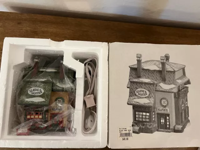 Department 56 North Pole Series Elfie’s Sleds and Skates #56251  Retired Village