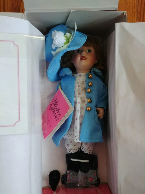 Paradise Galleries Treasury Collection Porcelain Doll Thursday's Child