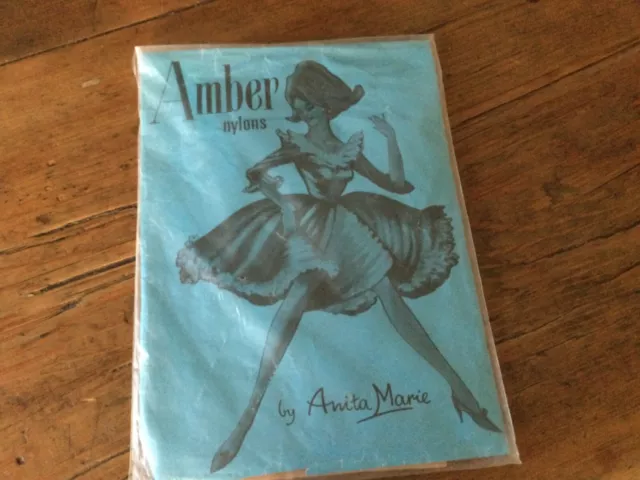 Original vintage 1950 stockings,AMBER .Shade light tan seamfree.size medium