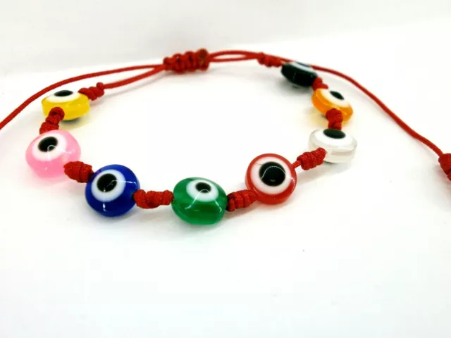 2 Pulsera amuleto  " ABRIL" charms multicolor ojo turco