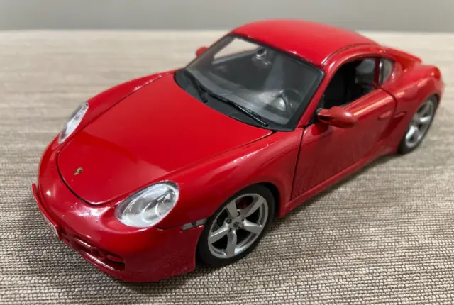 Maisto die cast model of a Porsche Cayman S 1/18th scale. Red.