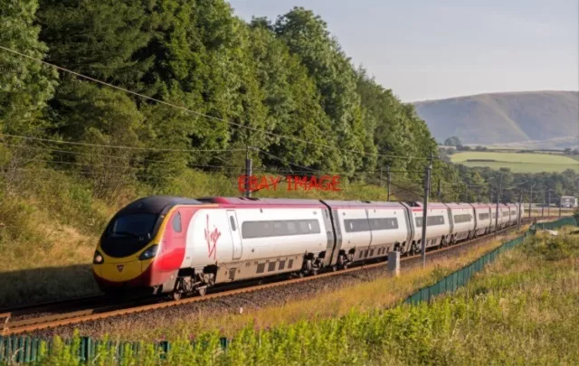 Photo  Southbound Pendolino At Greyrigg -  A Virgin Trains Pendolino Set Is At G