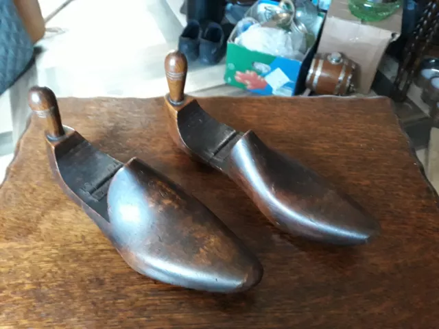 antique wooden shoe stretcher  lasts,stamped with the coblers address,and size