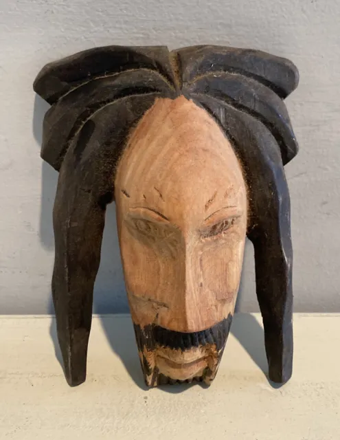 Hand carved and stained wooden man’s face￼ Rasta Dreadlocks Bob Marley Rustic