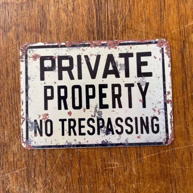 Private property no trespassing  - metal sign plaque