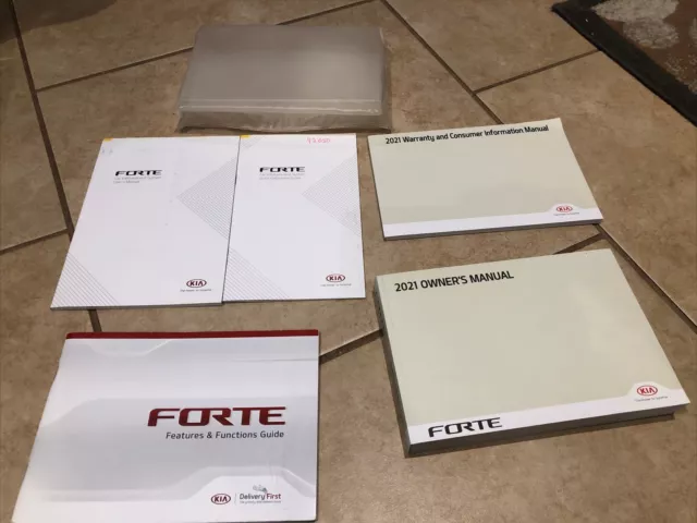 2021 Kia Forte Owners Manual with warranty guide and warranty books and case