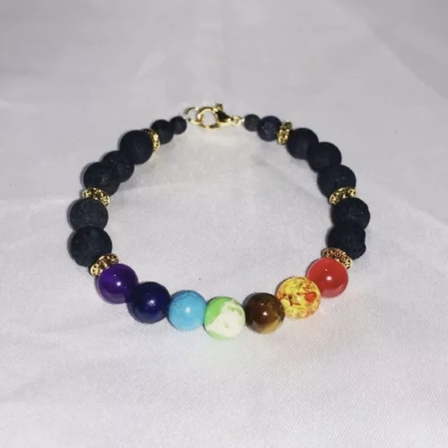 Chakra With Black Lava Beads Gold Spacer Bracelet