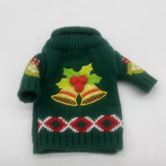 Botella de vino de Navidad fea cubierta de suéter