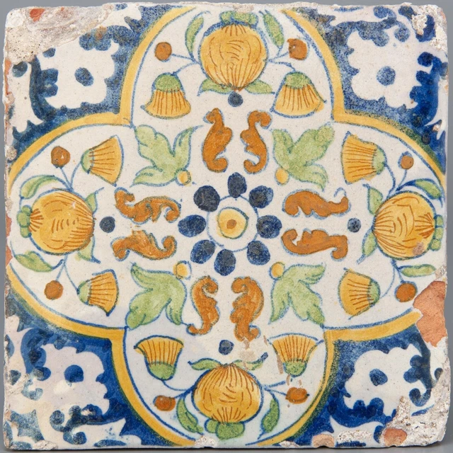 Nice Dutch Delft polychrome ornament flower tile, pompadour, first half 17th ct.