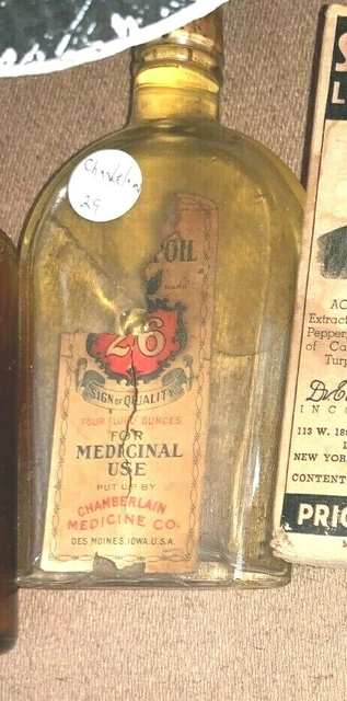 bottle CHAMBERLAIN CO OIL 26 PARTIALLY LABELED WITH CORK VINTAGE VERY RARE