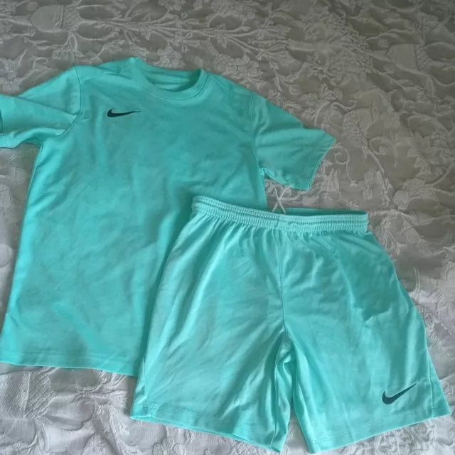 Boys Large like green Nike Shorts And T-shirts