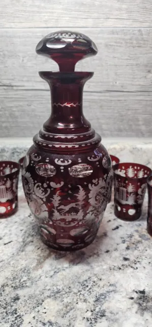 Ruby Red Czech Bohemian cut to clear Etched Castle Decanter & 7 Glasses